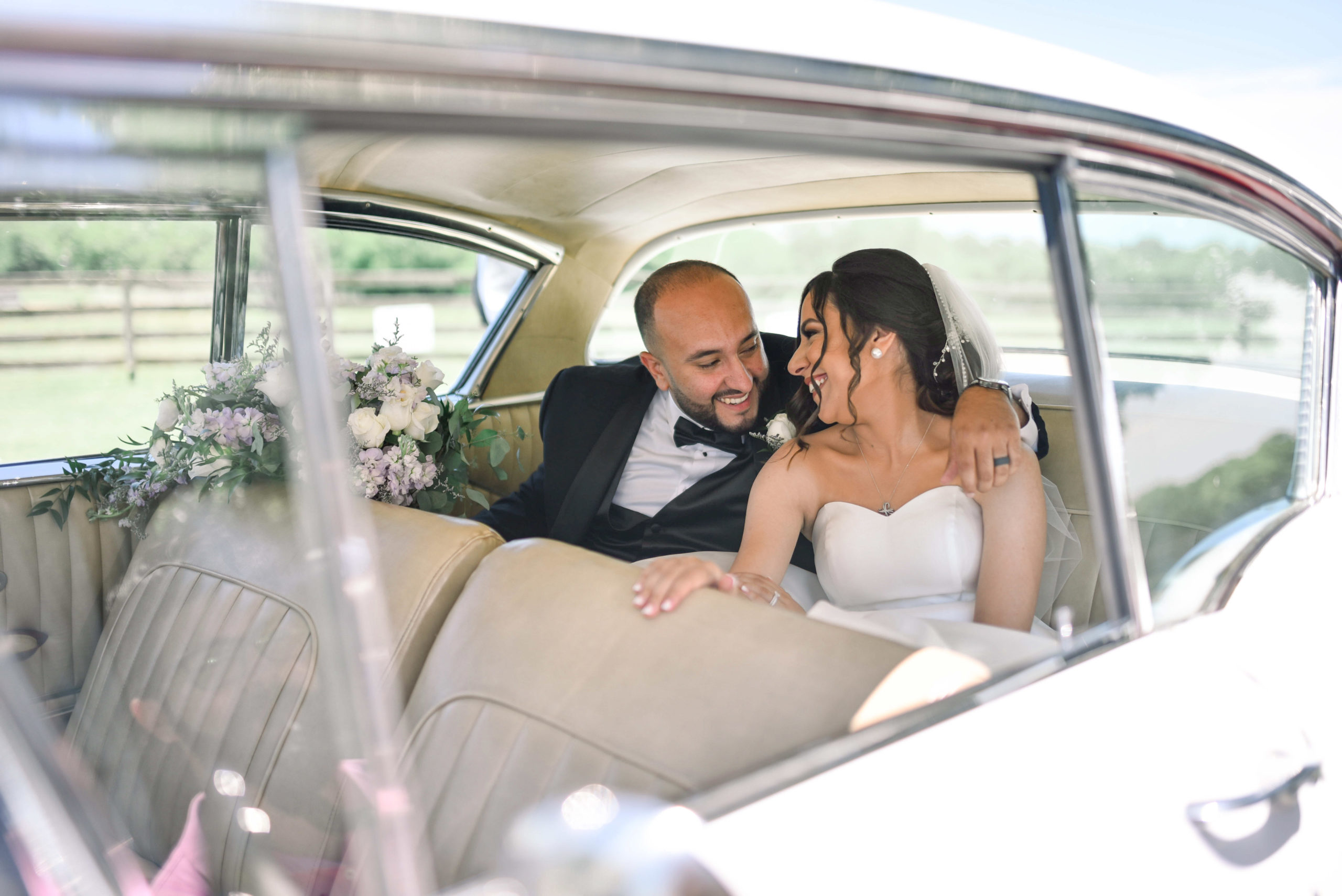 bride and groom in bel air chevrolet